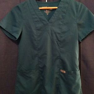 SOLD on Merc. XS scrub top